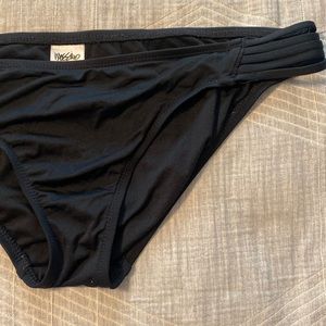 Womans black bathing suit bottom